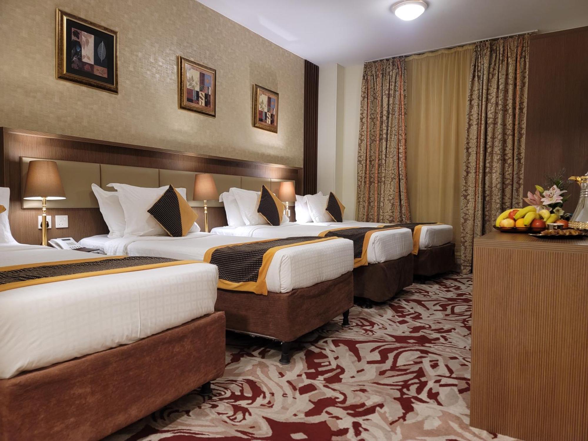 Qasr Al Ansar Golden Tulip Hotel Medina Bagian luar foto