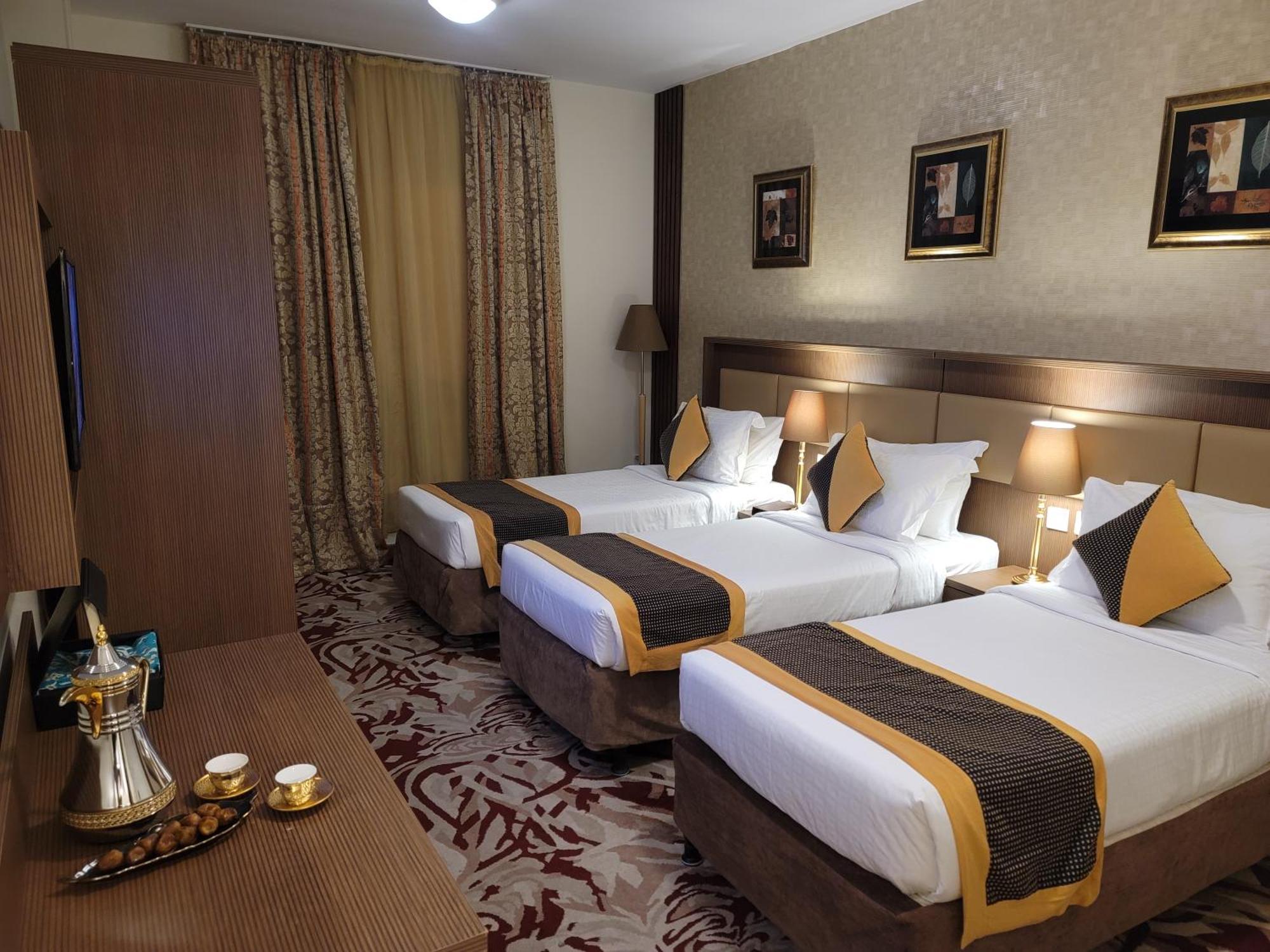 Qasr Al Ansar Golden Tulip Hotel Medina Bagian luar foto